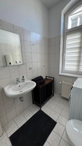 Ένα μπάνιο στο Stylishe Maisonette - 4 Schlafplätze - 2 Smart-TVs