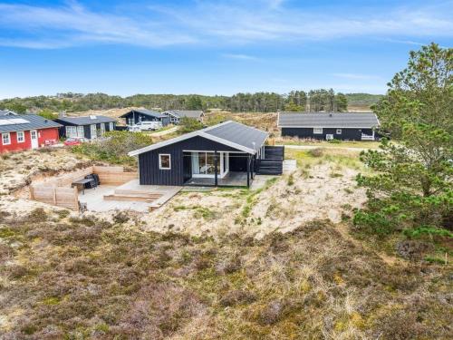 an aerial view of a house on a beach at Holiday Home Sulo - 1-4km from the sea by Interhome in Torsted