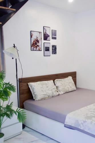 Cama o camas de una habitación en Cat Ba Santorini Homestay