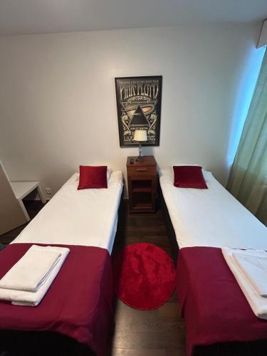 Postel nebo postele na pokoji v ubytování Rock Hotel Somero