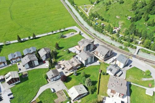 an aerial view of a residential neighborhood with houses at Panorama apartment for 2 near Zermatt with parking! in Täsch