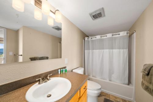 a bathroom with a sink and a shower at Ocean Front with Mountain Views and Central AC in Wailuku