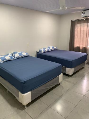 Postel nebo postele na pokoji v ubytování Casa moderna cerca de la playa