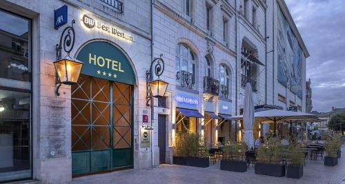 a building with a hotel on a street at Best Western Poitiers Centre Le Grand Hôtel in Poitiers