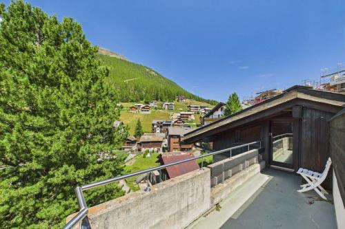 a view from the balcony of a house at Family & friends cabin in Saas-Fee in Saas-Fee