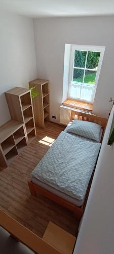 Ένα ή περισσότερα κρεβάτια σε δωμάτιο στο Apartments White - Hill