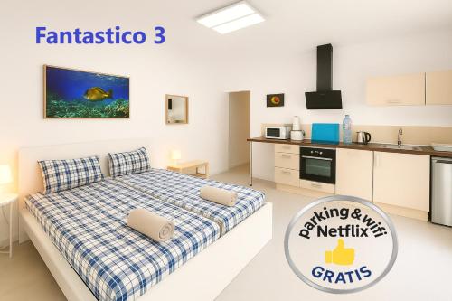 Ένα ή περισσότερα κρεβάτια σε δωμάτιο στο Fantastico Apartments Terrasse Balkon Klima Küche Gratis Parkplatz BBQ Puerto de la Cruz