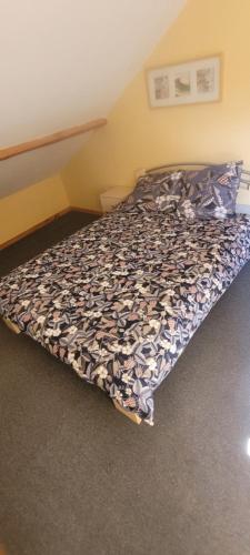 Cama ou camas em um quarto em La Clé des Champs