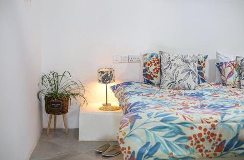 Ένα ή περισσότερα κρεβάτια σε δωμάτιο στο Shoraju Estate