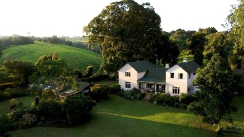 an aerial view of a white house on a hill at Villa Rosa Kempinski in Nairobi