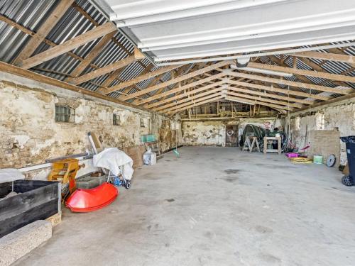 a large room with a large room with wooden ceilings at Holiday Home Kerrin - 1km from the sea by Interhome in Hanstholm