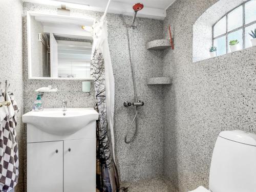 a bathroom with a shower and a sink at Apartment Veronica - 700m from the sea by Interhome in Sæby