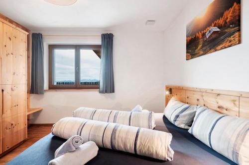 Cama o camas de una habitación en Almhaus Morgenrast