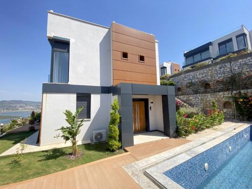 a rendering of a house with a swimming pool at Luxury Villa w Private Pool Panoramic View in Bogazici