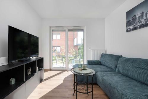 Elegant White Apartment with Terrace & Parking in Wrocław by Noclegi Renters