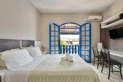Cama o camas de una habitación en Apartamentos 350m do mar