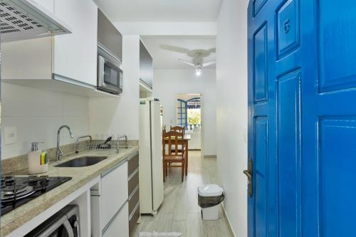 Una cocina o zona de cocina en Apartamentos 350m do mar
