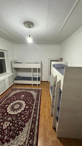 Ένα ή περισσότερα κρεβάτια σε δωμάτιο στο Ask HOSTEL