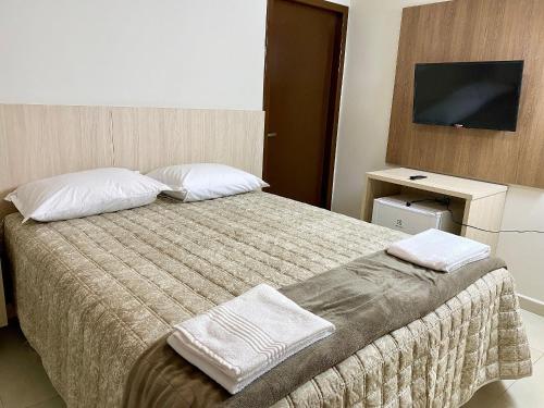 Postel nebo postele na pokoji v ubytování Edifício Shalfa