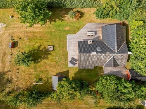 an overhead view of a house with a roof at Holiday Home Thurir - 4km from the sea by Interhome in Fjerritslev