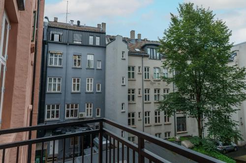 a view from a balcony of buildings at MAYA Apartments - Parkveien in Oslo