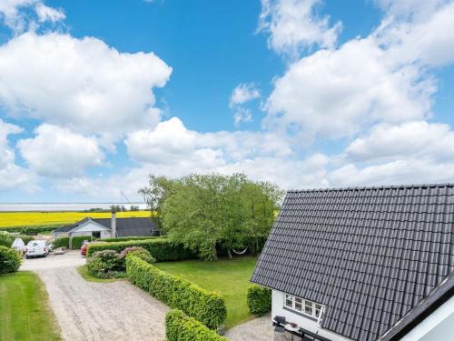 an aerial view of a house with a garden at Holiday Home Tamer - 500m to the fjord by Interhome in Farsø