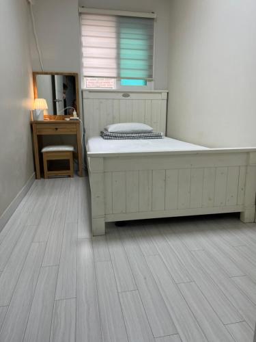 Postel nebo postele na pokoji v ubytování Cobe Guesthouse Dongdaemun