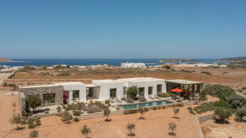 an aerial view of a house in the desert at Ampelas 4BR Villa, Private Pool, To Ktima Paros in Naousa