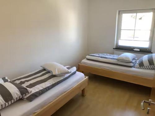 Postel nebo postele na pokoji v ubytování Ferien du For