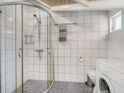 a bathroom with a shower and a toilet at Holiday Home Hailka by Interhome in Give