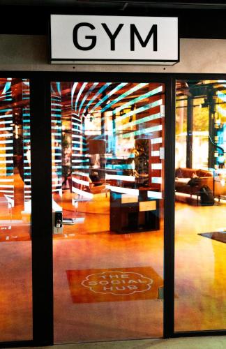 a window of a store with a sign on it at The Social Hub Berlin Alexanderplatz in Berlin