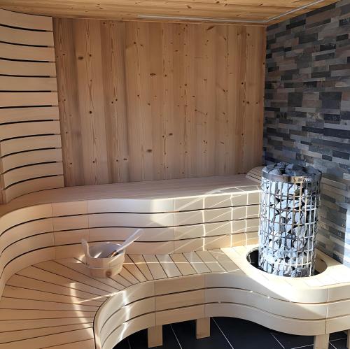 Posezení v ubytování Mini Chalet Ananda