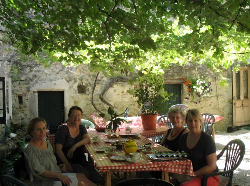 a group of women sitting at a table at Appartement 1 in Montboucher-sur-Jabron