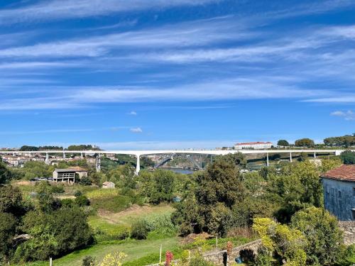 a view of a bridge over a river at Quinta de Sá in Vila Nova de Gaia