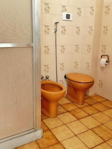 Ένα μπάνιο στο Hospedagem Inclusiva - Quarto com Banheiro