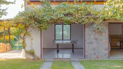 an entrance to a house with a table in it at Vila Familia in Turčianske Teplice