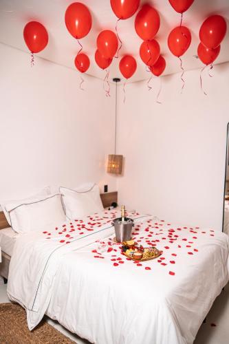 Katil atau katil-katil dalam bilik di Mikiki Lifestyle Hotel
