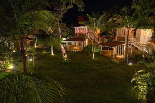 an aerial view of a house at night at FlowHouse Jeri - Hotel & Coworking in Jericoacoara