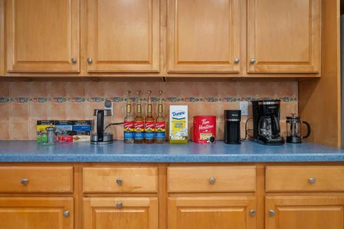 a kitchen counter with a blue counter top at 3BR Apt Near Train Balcony Yonkers in Yonkers