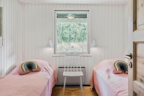 Postel nebo postele na pokoji v ubytování 51407-Ulfborg-Sdr-Fjandvej-38