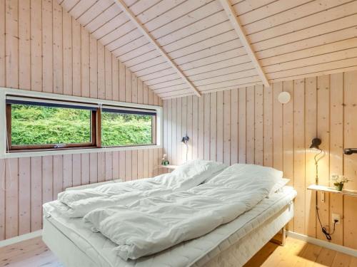 Katil atau katil-katil dalam bilik di Holiday Home Sarah by Interhome