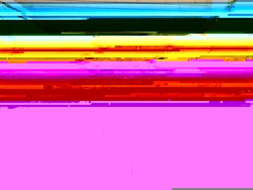 a pile of rainbow colors on a pink background at Holiday Home Zezilie - 125m from the sea by Interhome in Gørlev