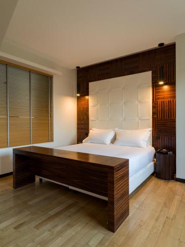 UNA HOTELS One Cataniaにあるベッド