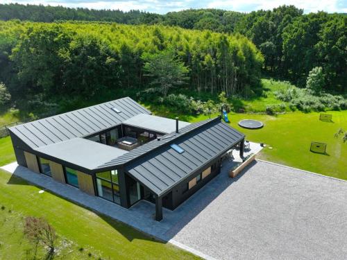 an overhead view of a house with a roof at Holiday Home Aviana - 500m from the sea by Interhome in Glesborg