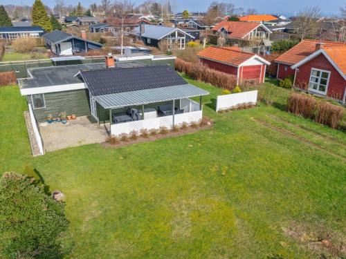 an overhead view of a house with a yard at Holiday Home Bjarni - 175m from the sea by Interhome in Malling