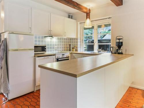 Η κουζίνα ή μικρή κουζίνα στο Holiday Home Einari - 1-2km from the sea by Interhome