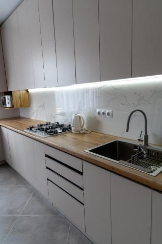Dapur atau dapur kecil di Апартаменти