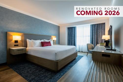 a hotel room with a bed and a television at Miccosukee Casino & Resort in Miami