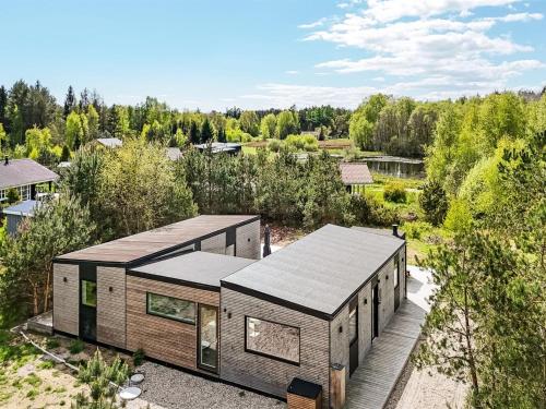 an overhead view of a house with wood panels at Holiday Home Danske - 6-8km from the sea by Interhome in Ebeltoft