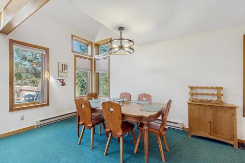 a dining room with a table and chairs at Haystack 32 in Wilmington